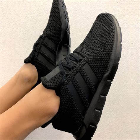 all black adidas trainers women's.